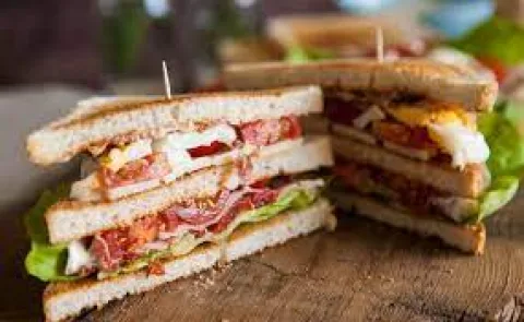 Club sandwich with fries